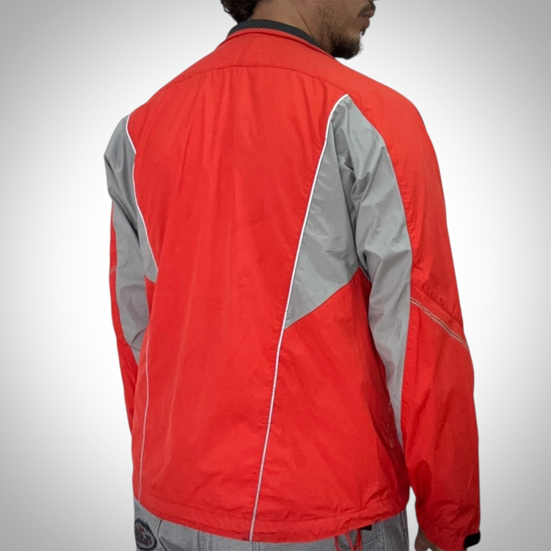 Giacca Nike running arancione fluo