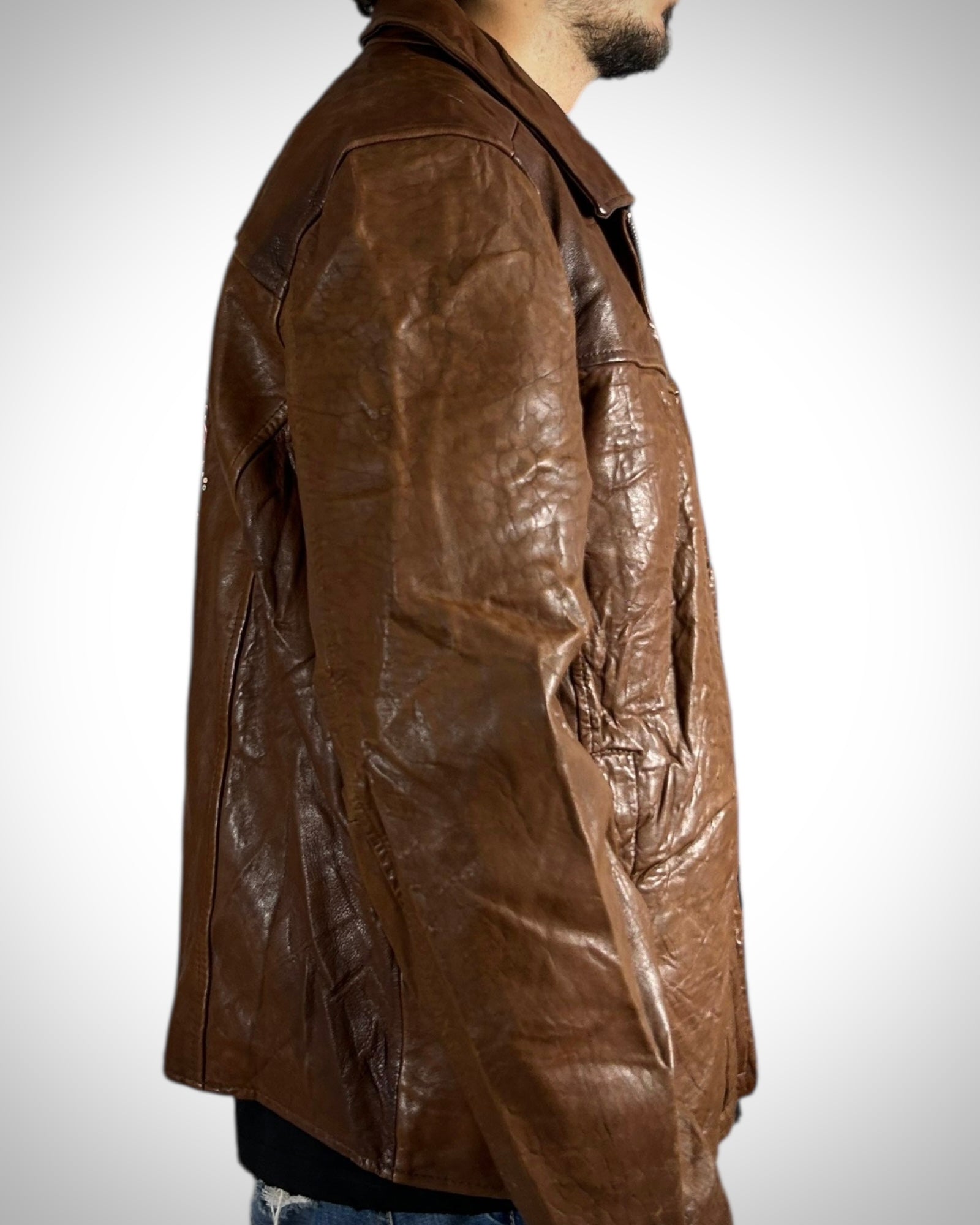 Giubbotto vintage in vera pelle marrone Daniel Crémieux con patch tigre posteriore